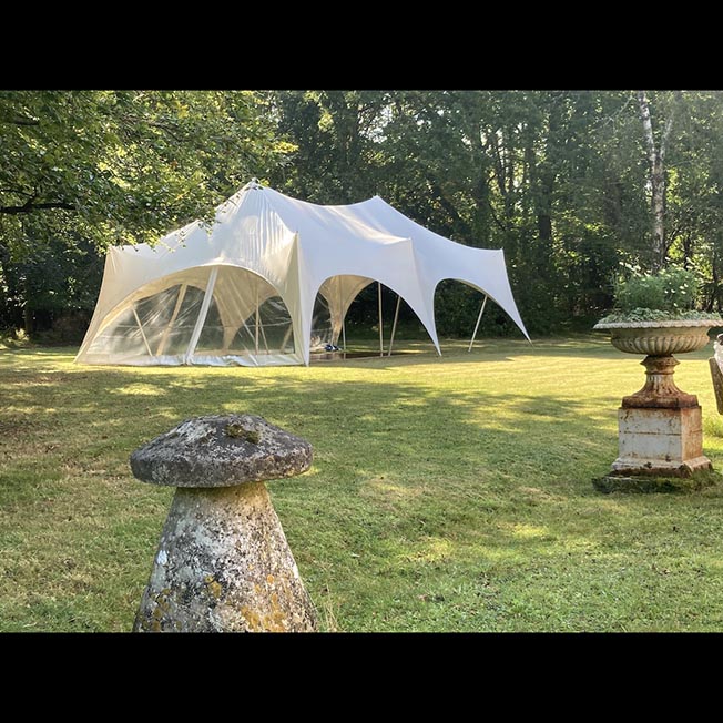 Outdoor Tent Rental for 28' x 38' Capri Tent installed on grass 