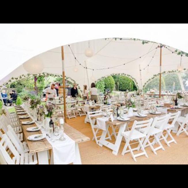 Interior of 28' x 38' Capri Tent Rental with furniture for a small intimate wedding in Winnipeg