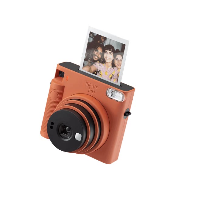 Image showing Red Fujifilm Instant SQ Camera with Instant Colour Photo Film 