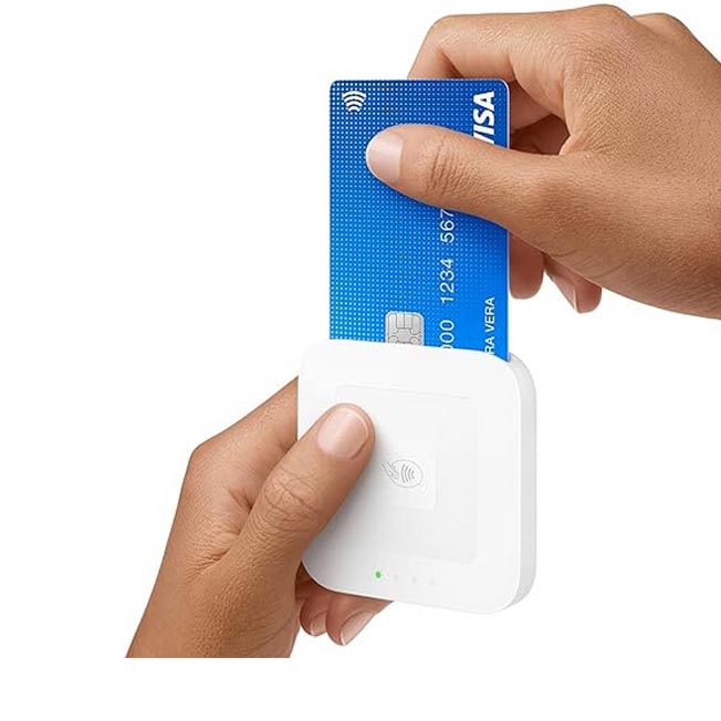 Image shows a Square Card reader being held up for a transaction. This reader is available for rent